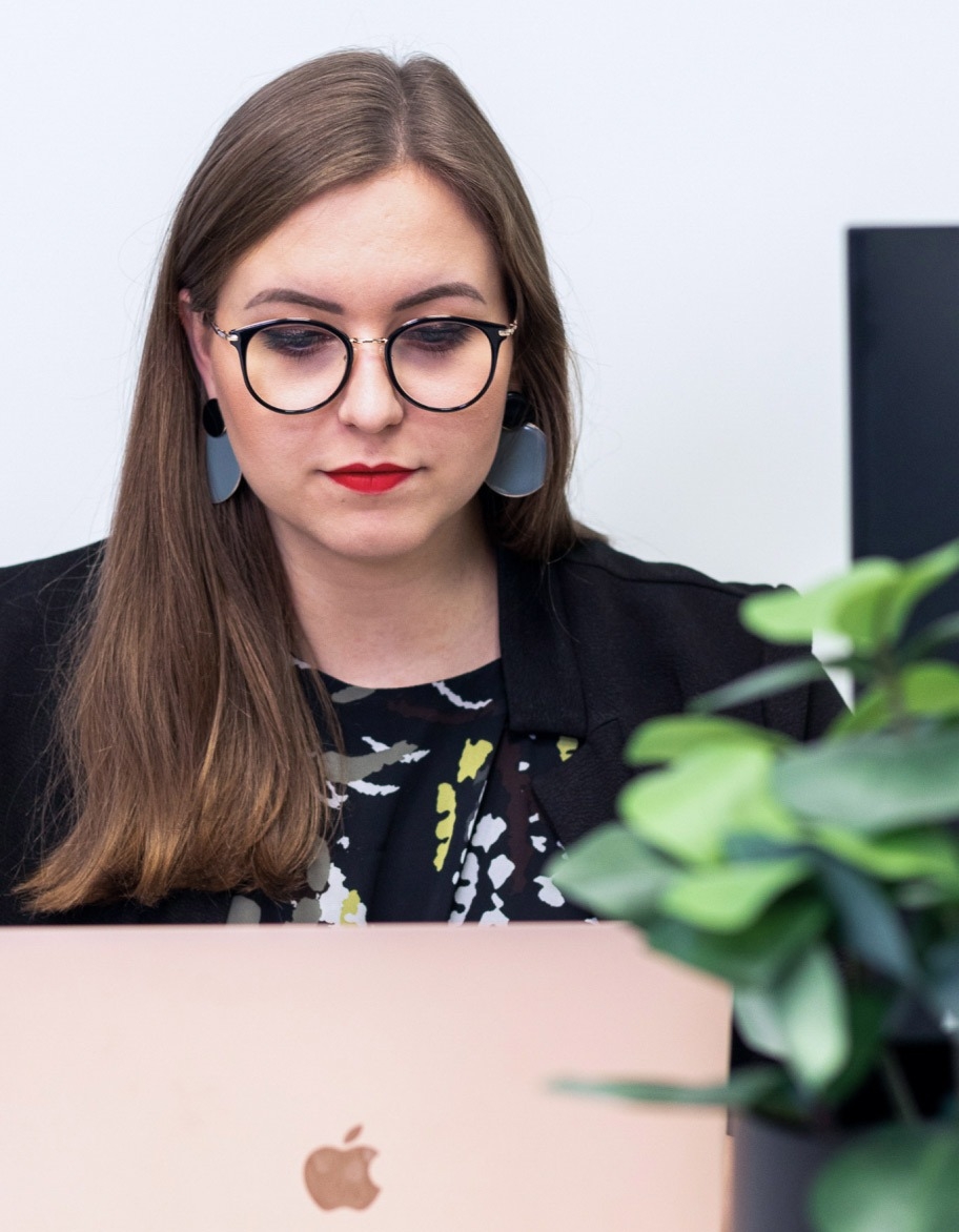 ISO advisor working with her laptop.